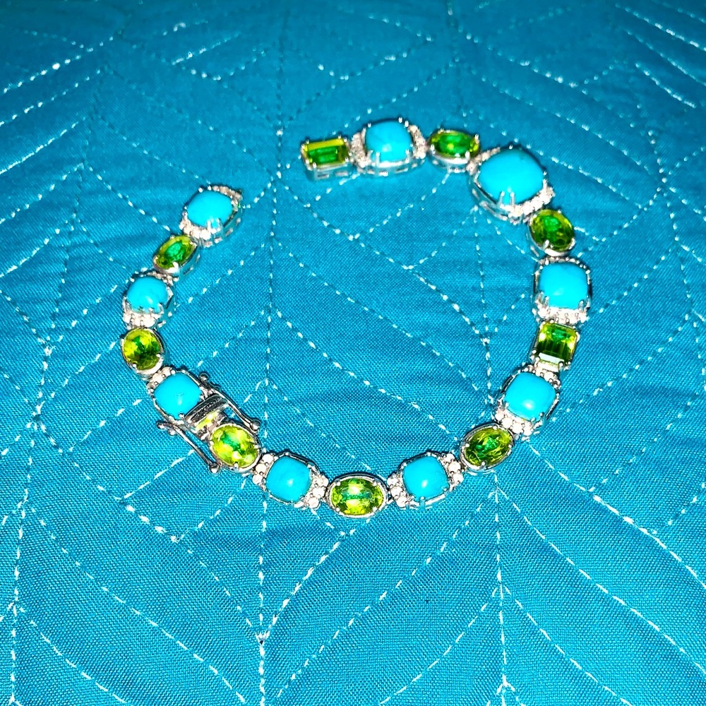 Sterling silver and precious gemstone bracelet.